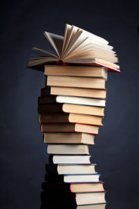 Pile of books on a black background