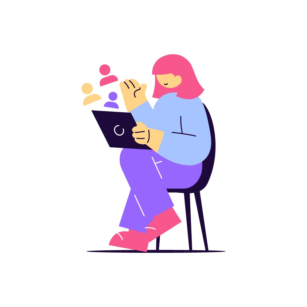 woman sitting with a laptop